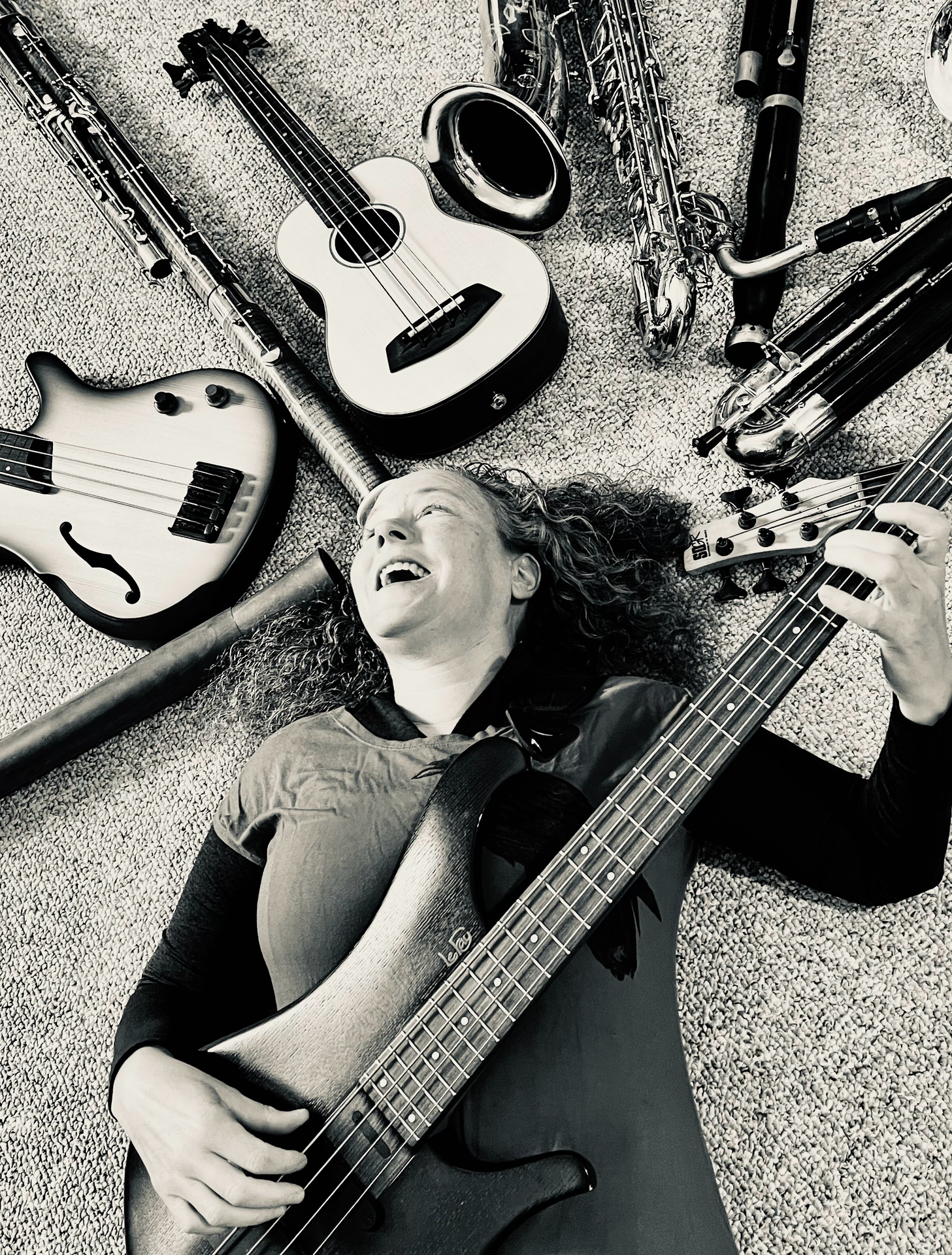 tracie whitelaw with bass instruments black and white